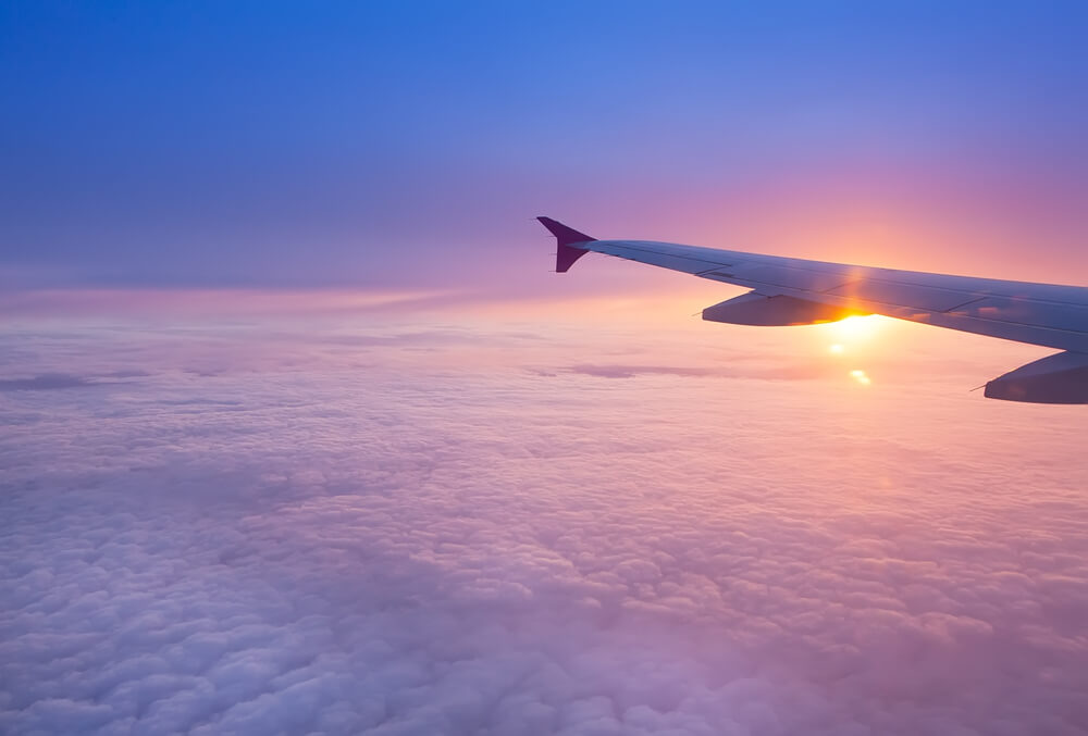 Plane-clouds-wing